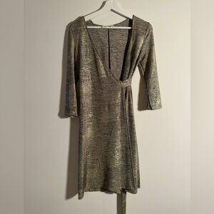 Gold wrap dress from boutique label, size small. NWOT.